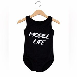 Small Shop Made Black 'Model Life' Bodysuit. Excellent Condition. Size 2-4 Years